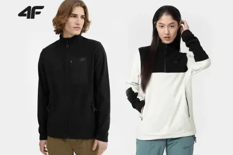 Mann und Frau tragen warme Fleecejacken. Fleece ist ein weiches, isolierendes Material, perfekt für kühle Tage.