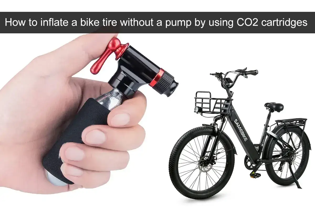 CO2-Kartusche zum Fahrradreifen aufpumpen ohne Pumpe. Ein schwarzes E-Bike steht daneben.